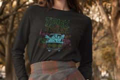 SD-Scoobtober_crewneck-sweatshirt-mockup-featuring-a-happy-woman-posing-in-the-park-31809